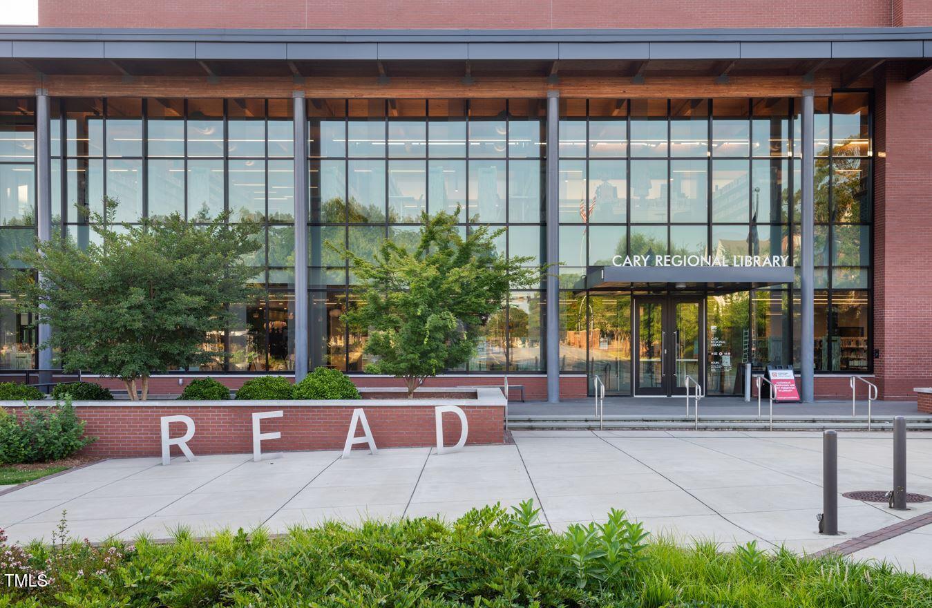 2906 Kempthorne Road Cary, NC 27519 - Photo 30 of 38 a view of a building and a yard