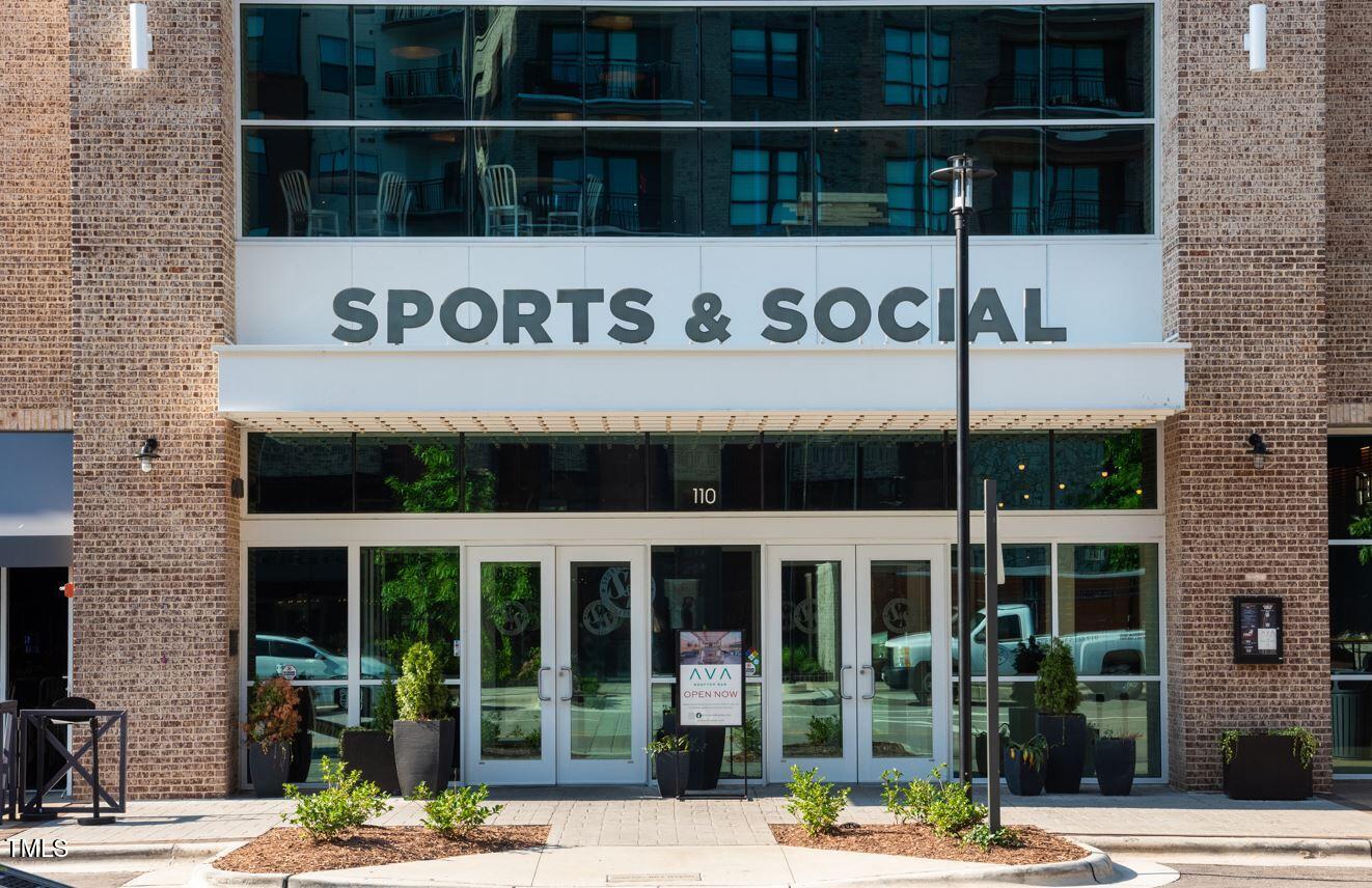 2906 Kempthorne Road Cary, NC 27519 - Photo 36 of 38 a view of a brick wall with a building on the wall