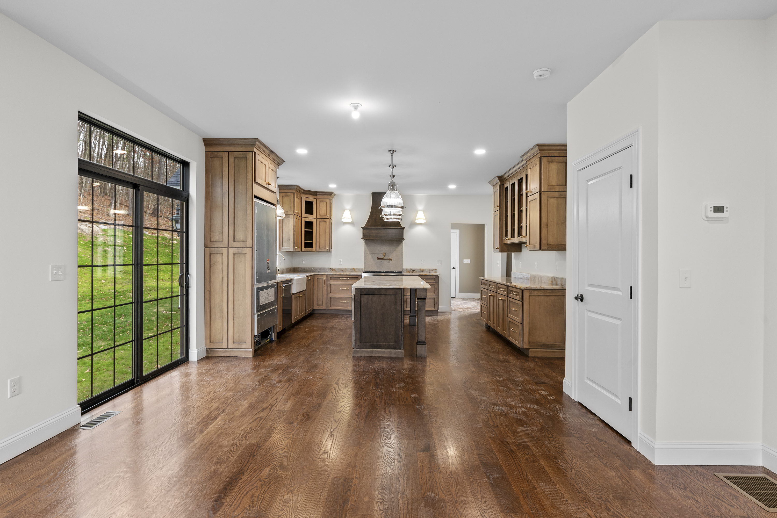 14 Lakewood Road East Hampton, CT 06424 - Photo 14 of 29 a view of a living room kitchen and a wooden floor
