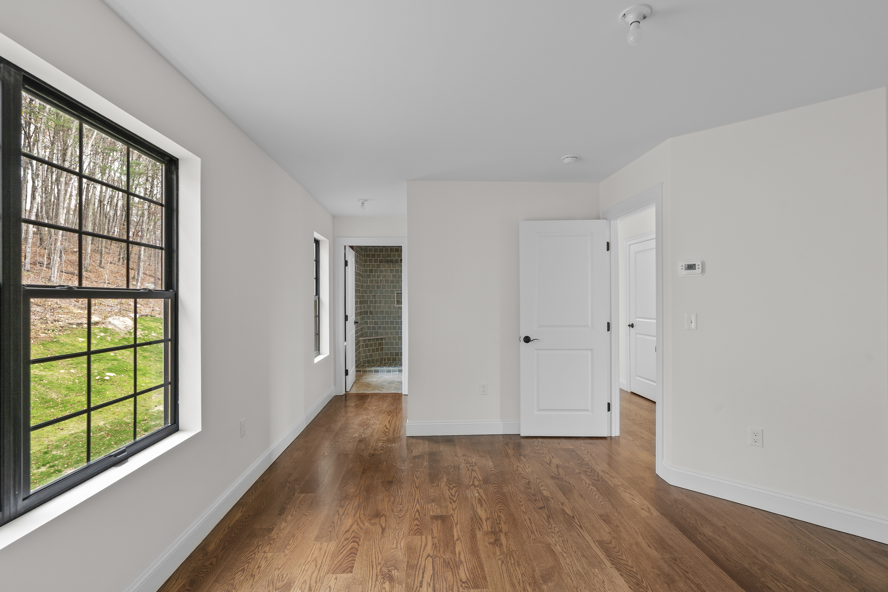 14 Lakewood Road East Hampton, CT 06424 - Photo 17 of 29 a view of an empty room with wooden floor and a window