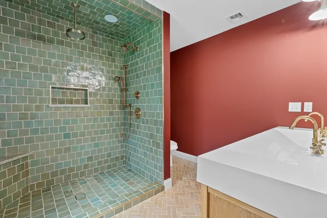 a bathroom with a sink and mirror