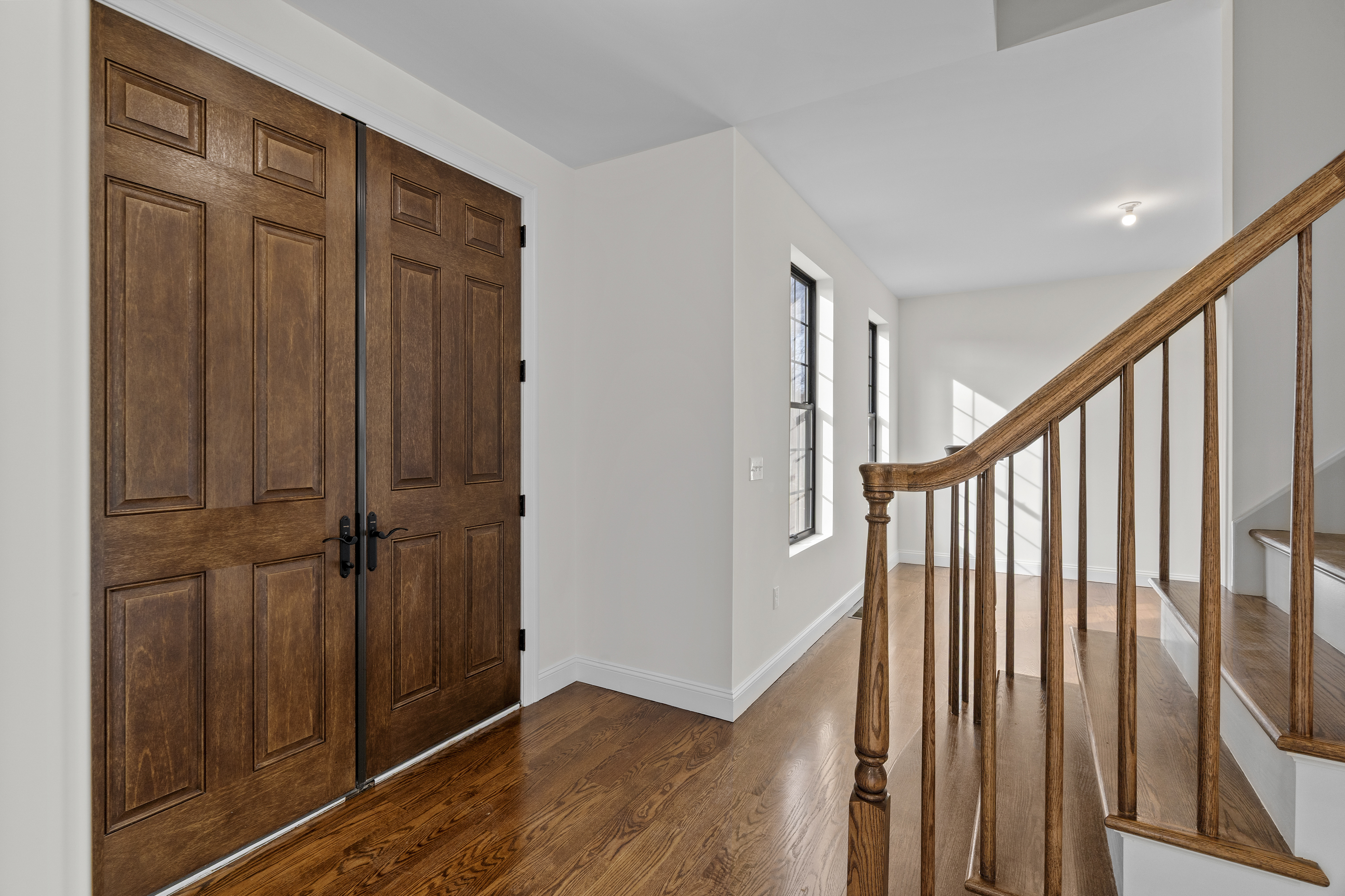14 Lakewood Road East Hampton, CT 06424 - Photo 3 of 29 a view of a hallway with wooden floor and staircase