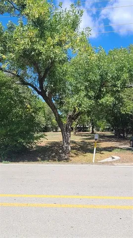 a view of a yard with an outdoor space