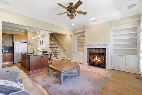 a view of a livingroom with furniture and a fireplace