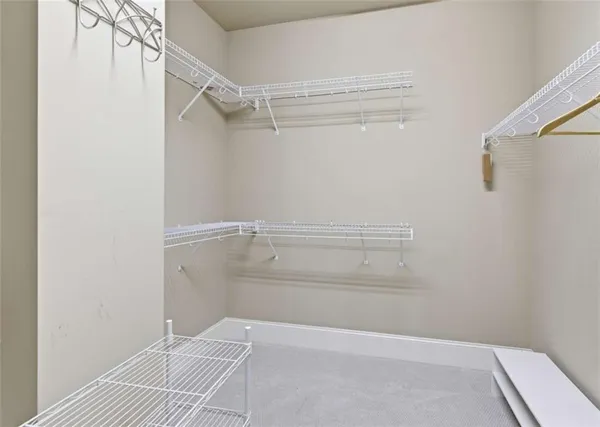 a bed room with a bed and a window
