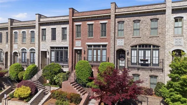 a house view with a garden space