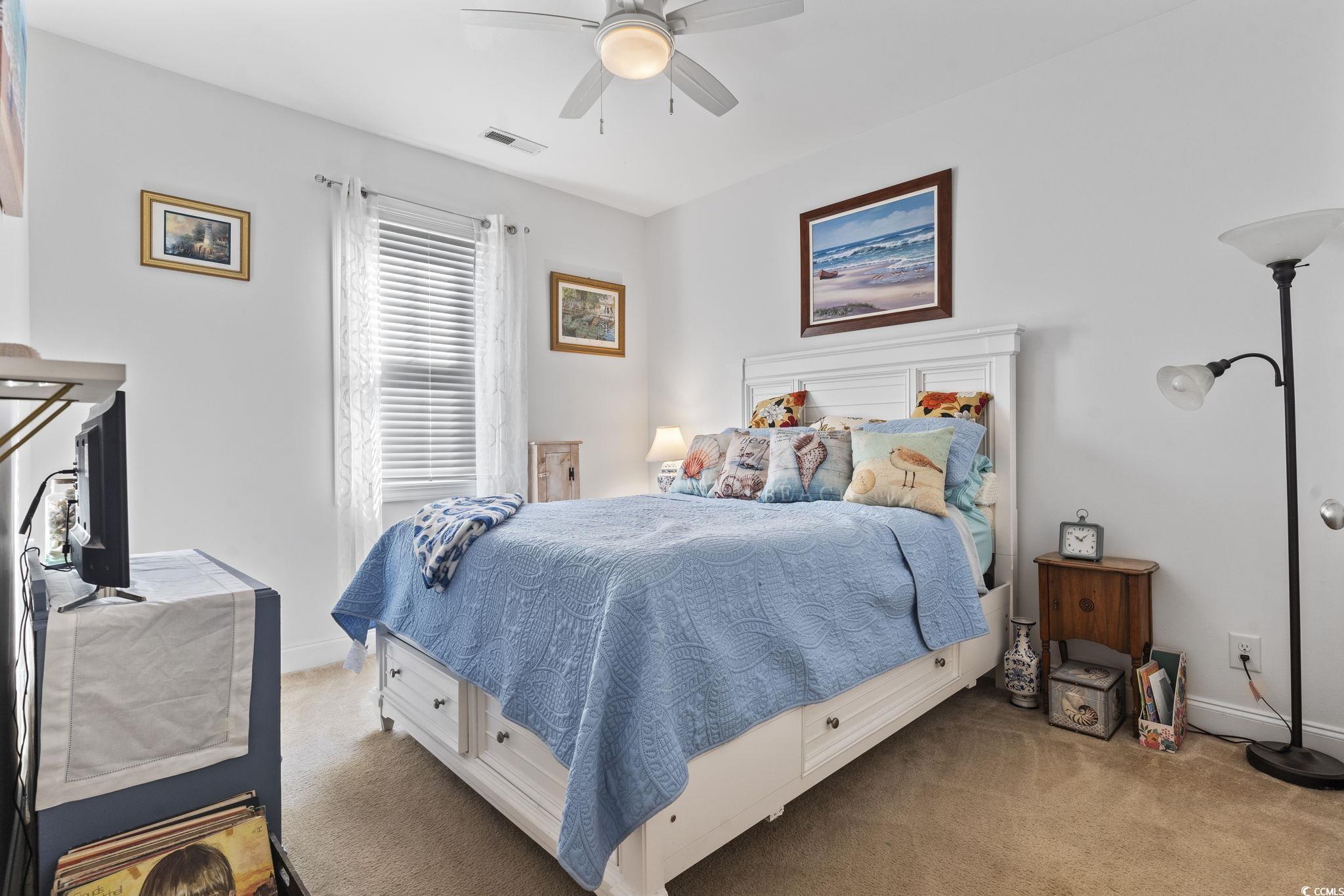 235 Waties Drive Murrells Inlet, SC 29576 - Photo 23 of 39 Bedroom featuring ceiling fan and light carpet