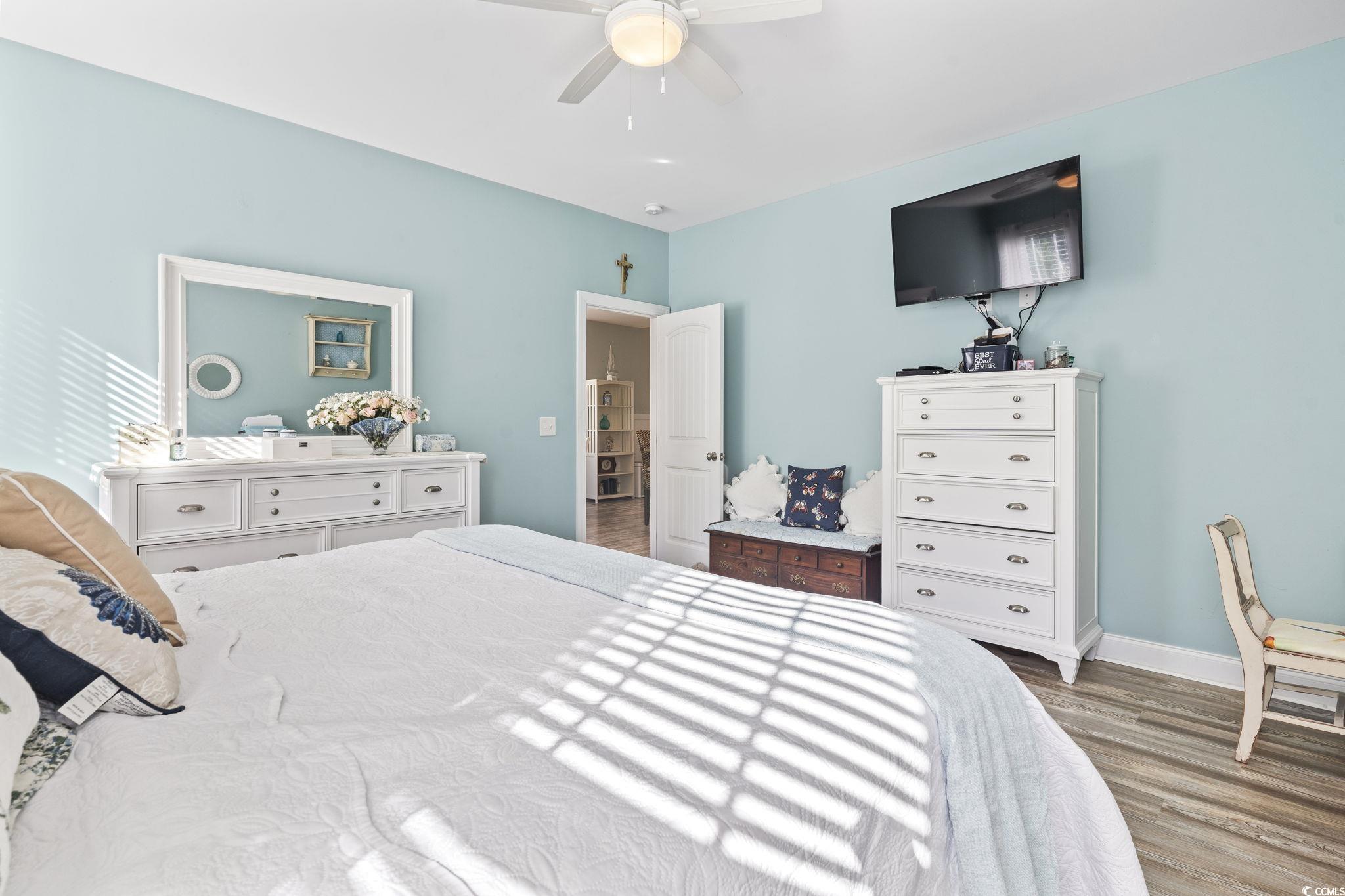 235 Waties Drive Murrells Inlet, SC 29576 - Photo 24 of 39 Bedroom featuring ceiling fan and dark hardwood /