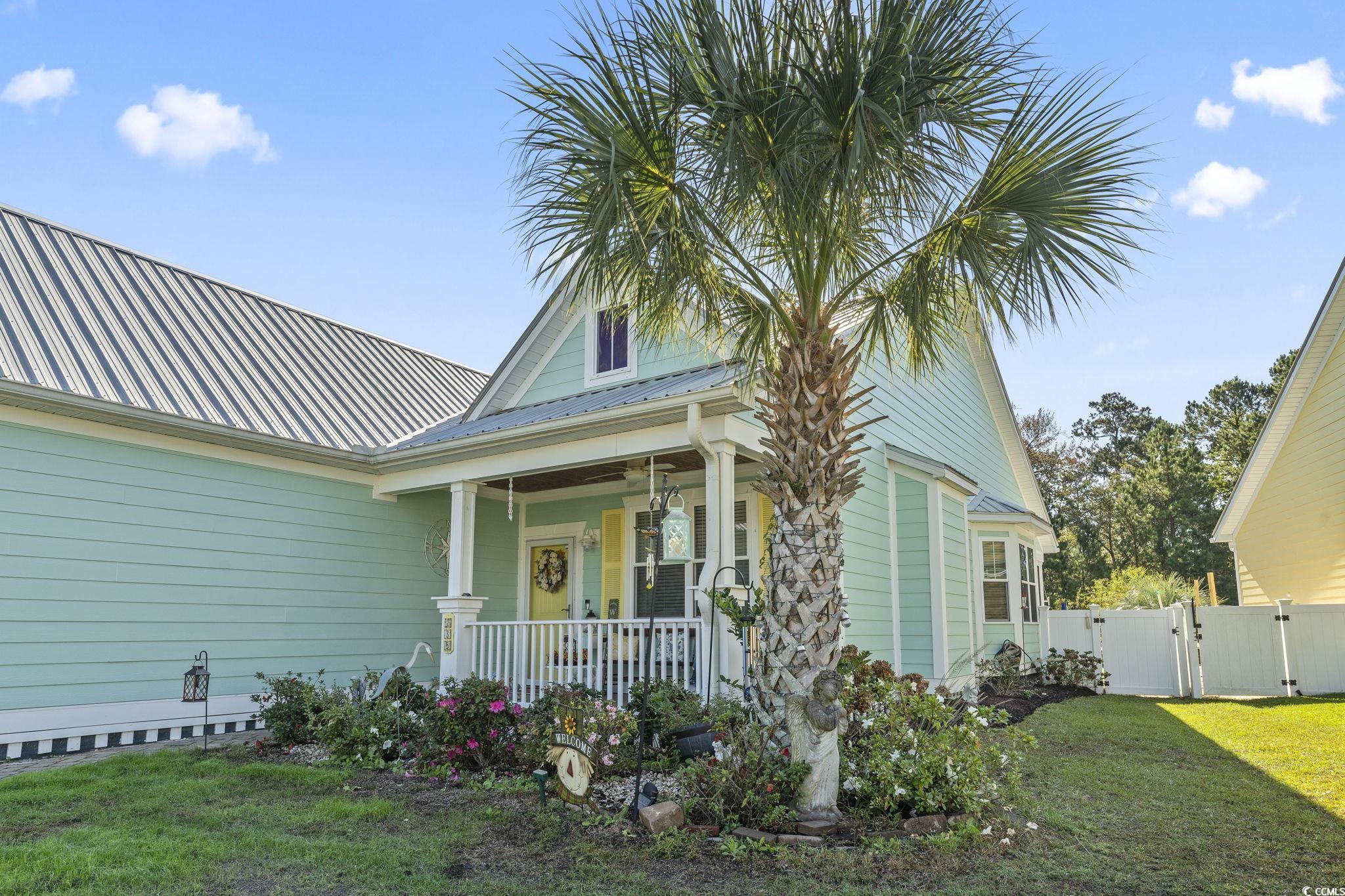 235 Waties Drive Murrells Inlet, SC 29576 - Photo 4 of 39 View of front of property with a front yard and co