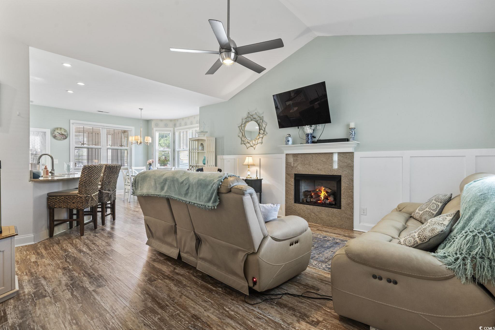 235 Waties Drive Murrells Inlet, SC 29576 - Photo 10 of 39 Living room featuring ceiling fan with notable cha
