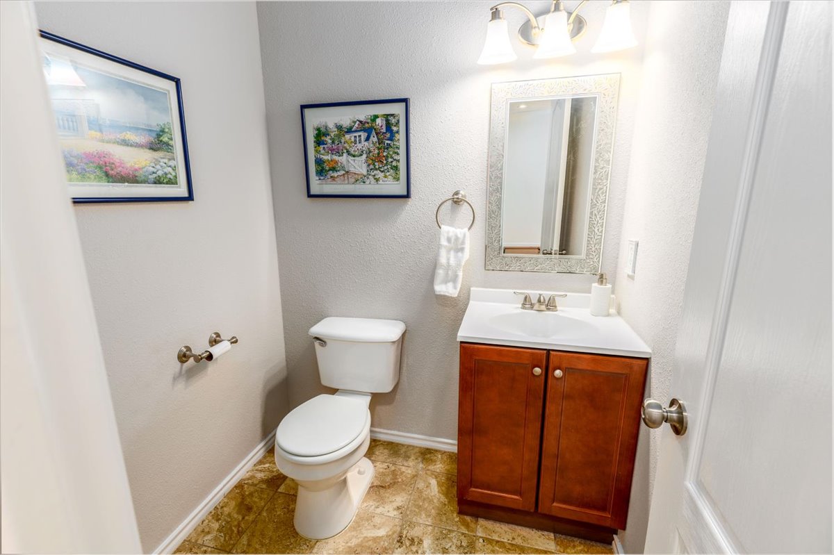 7136 Ridge Oak Road Austin, TX 78749 - Photo 13 of 28 Half Bathroom - main level