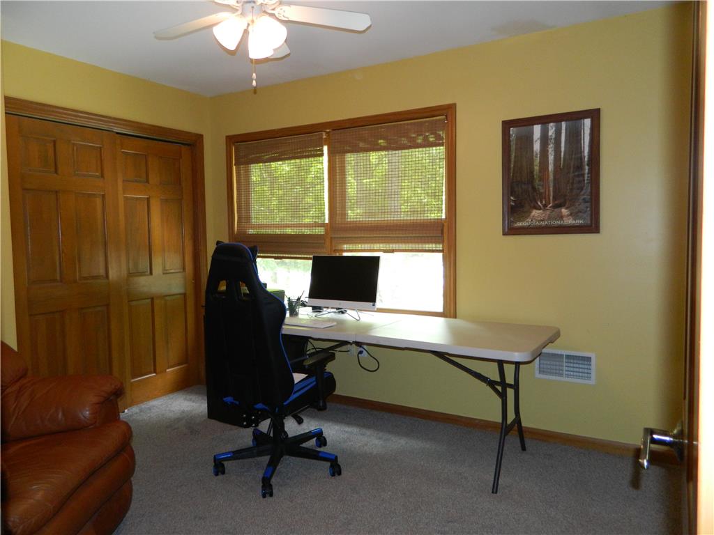 328 Pin Oak Road Stroudsburg, PA 18360 - Photo 34 of 37 A quiet retreat, this versatile space features warm wood doors and window blinds.