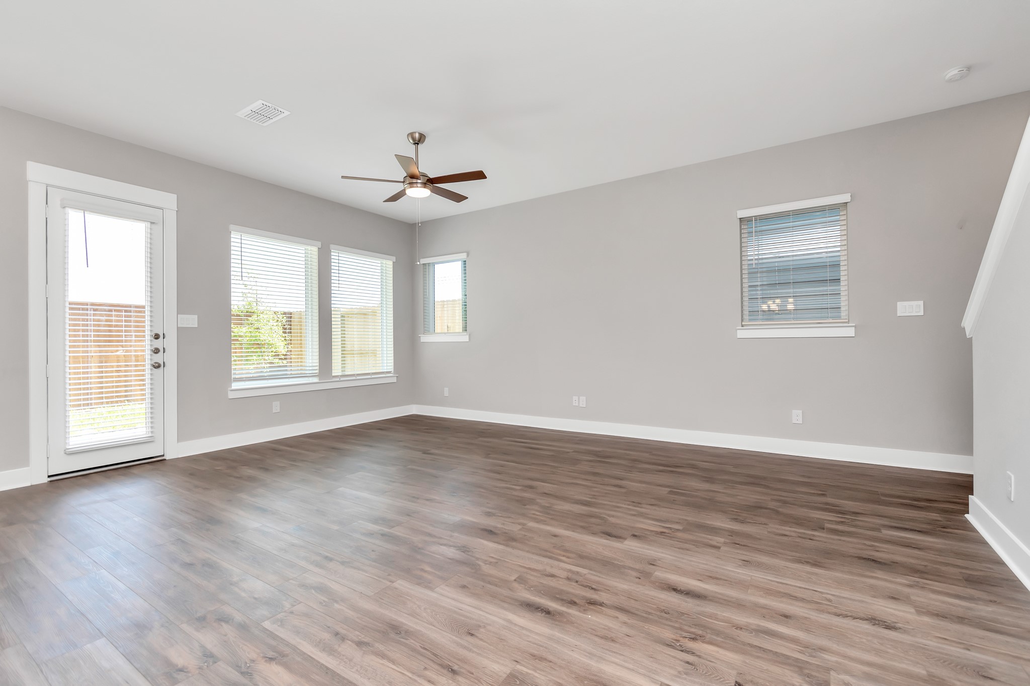 2717 Ruhman Flds Drive Houston, TX 77008 - Photo 4 of 43 wooden floor in an empty room with a window