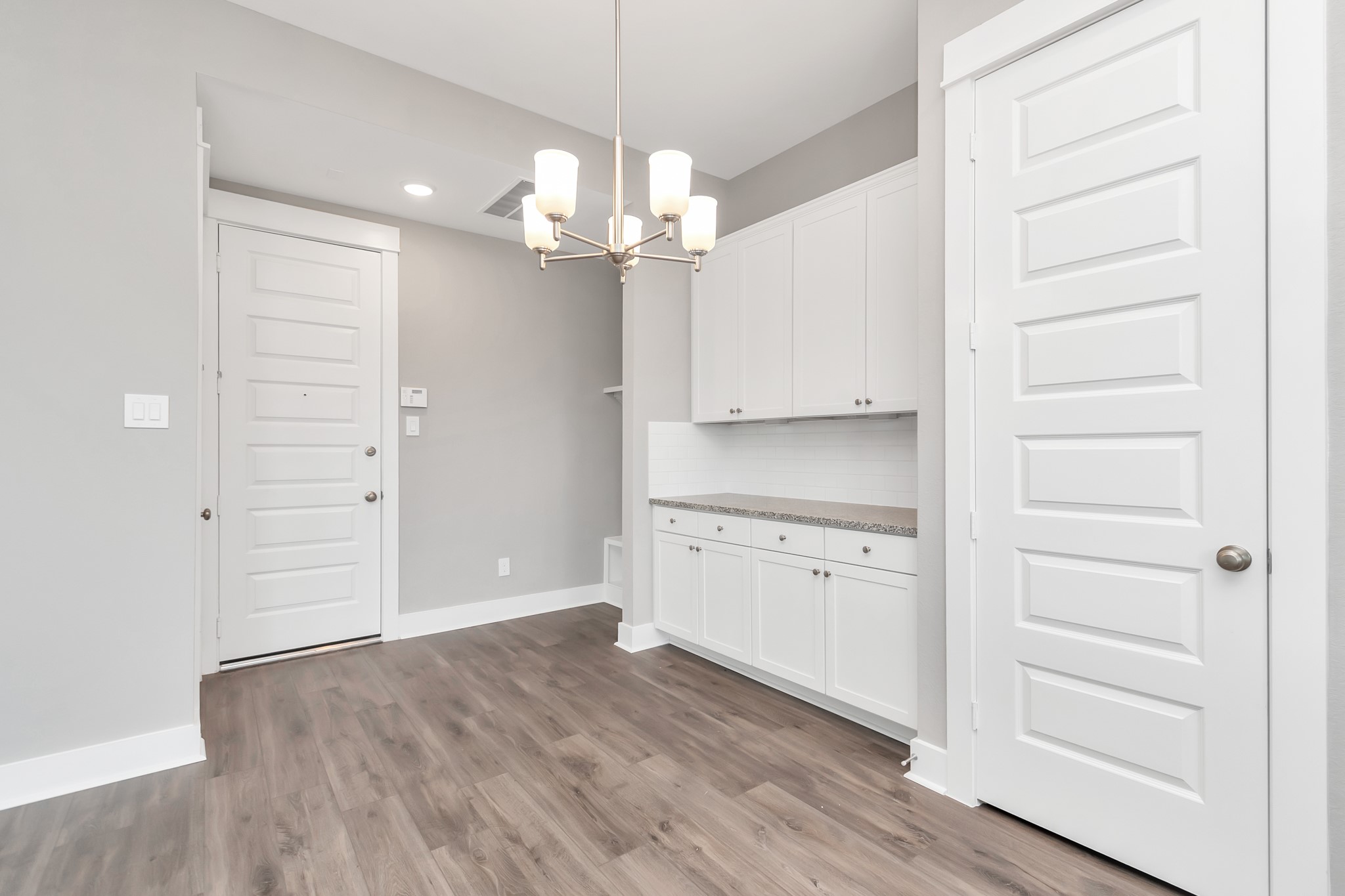 2717 Ruhman Flds Drive Houston, TX 77008 - Photo 5 of 43 a view of a kitchen with wooden floor