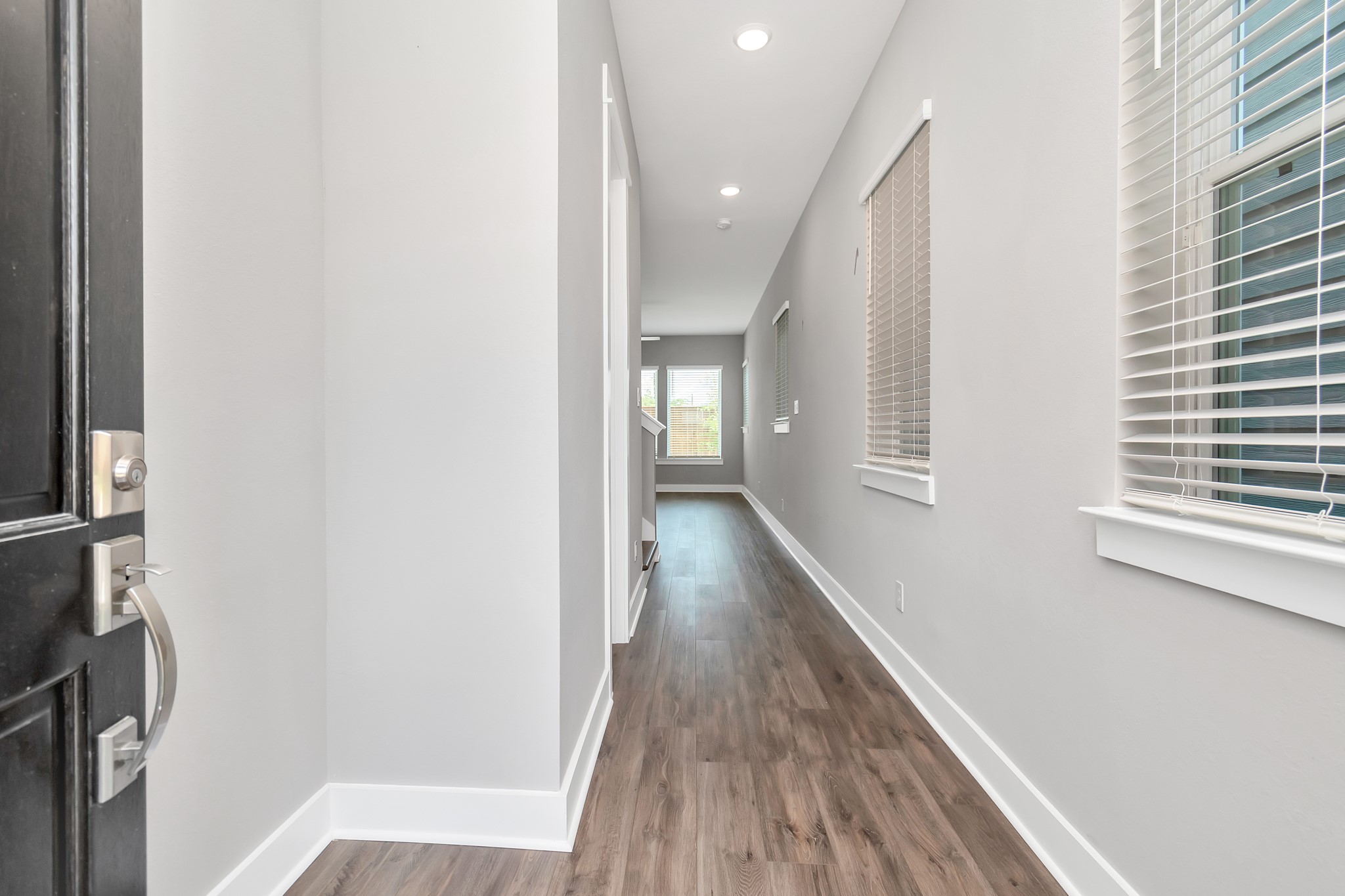 2717 Ruhman Flds Drive Houston, TX 77008 - Photo 7 of 43 a view of hallway with wooden floor