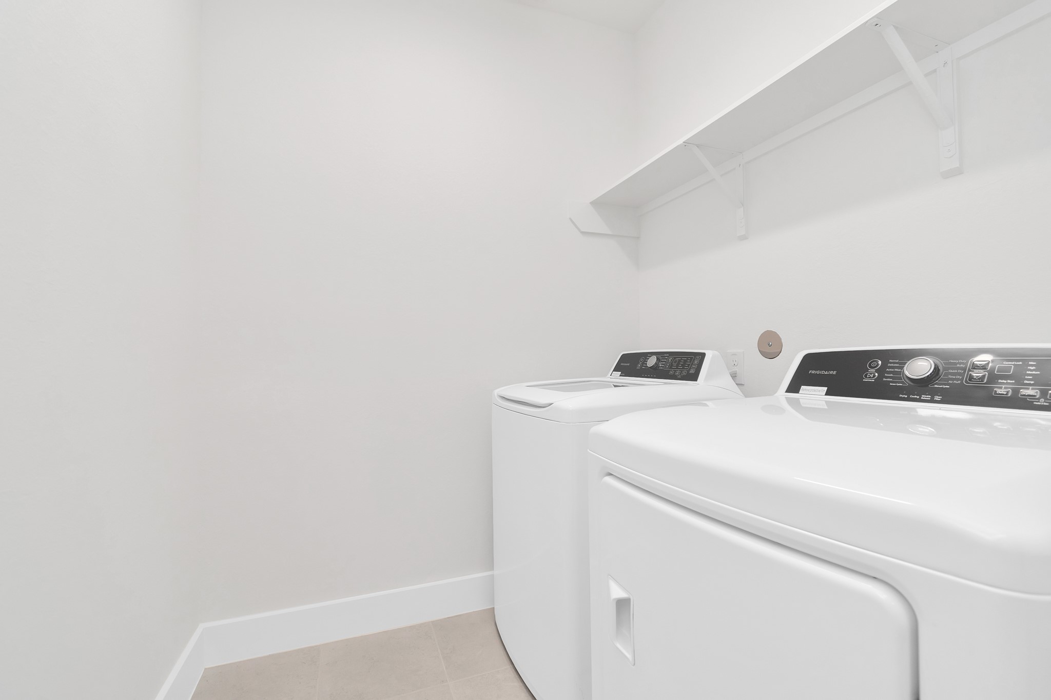 2717 Ruhman Flds Drive Houston, TX 77008 - Photo 25 of 43 a utility room with dryer and washer