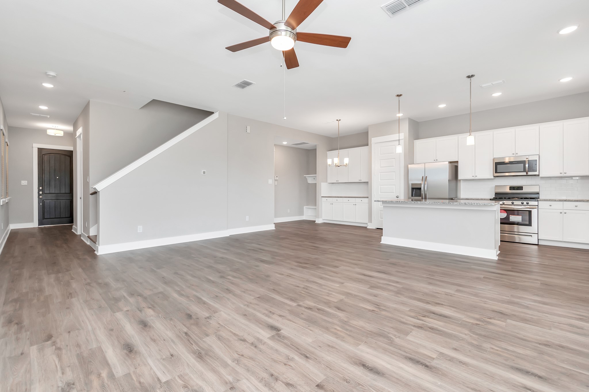 2717 Ruhman Flds Drive Houston, TX 77008 - Photo 41 of 43 a view of kitchen with wooden floor and window