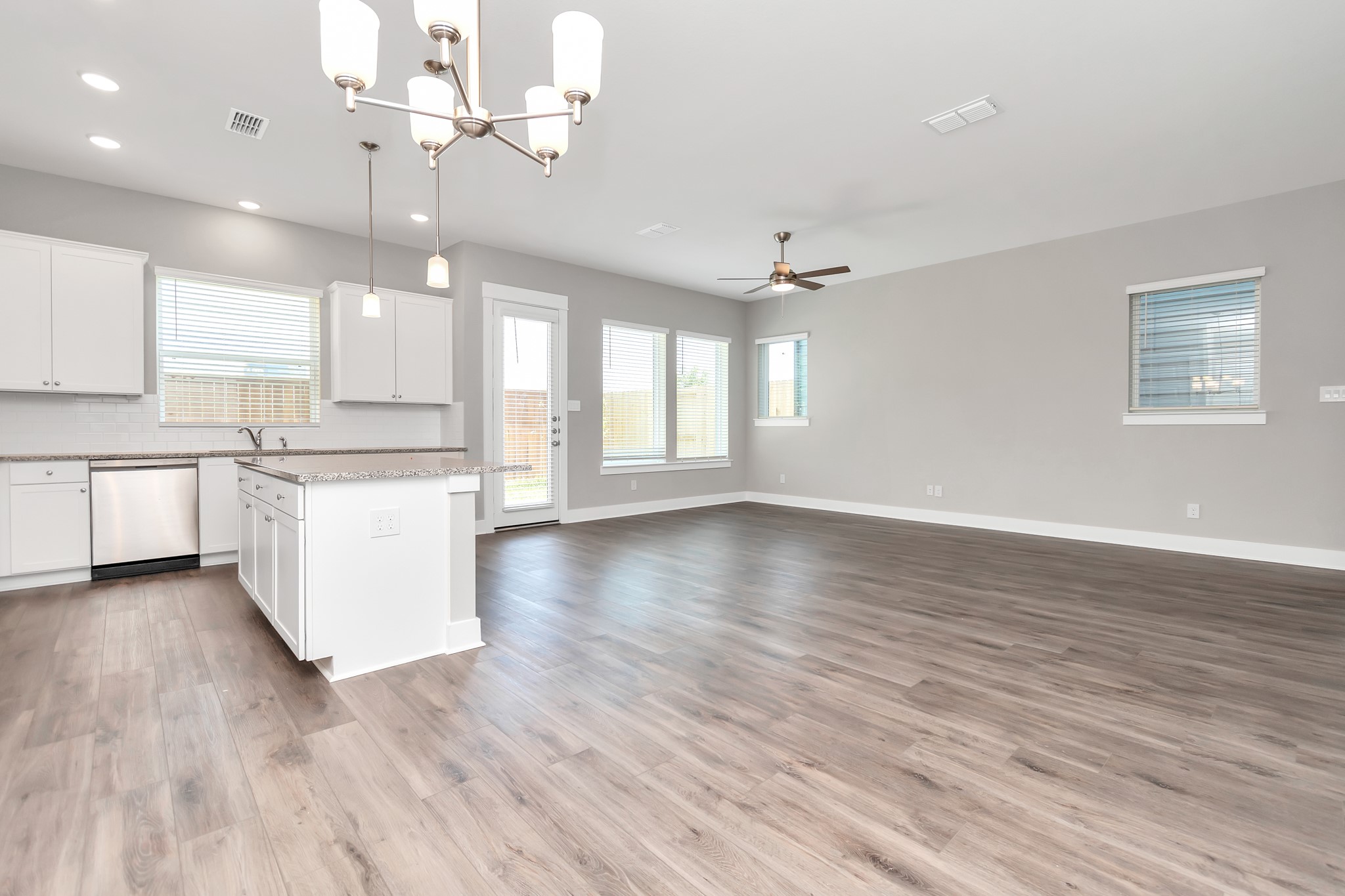 2717 Ruhman Flds Drive Houston, TX 77008 - Photo 43 of 43 a view of a kitchen with a dishwasher a stove a refrigerator cabinets and wooden floor