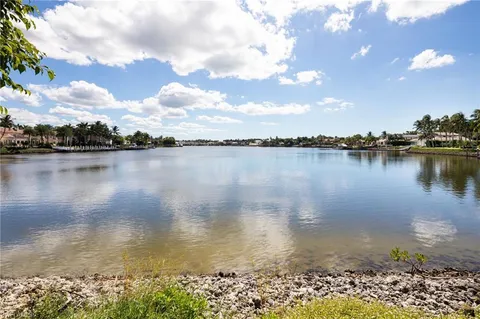 a view of a lake with a city