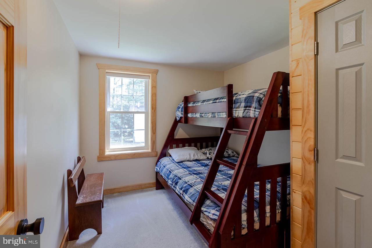 556 Treaster Kettle Road Centre Hall, PA 16828 - Photo 27 of 32 a bedroom with furniture and a window