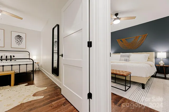 a bedroom with furniture and a window