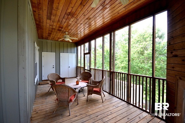 32700 Steelwood Ridge Road, Unit B Loxley, AL 36551 - Photo 22 of 25 Screened porch overlooking fairway