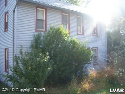 601 Slateford Road Mount Bethel, PA 18343 - Photo 1 of 1 a view of a house with a yard