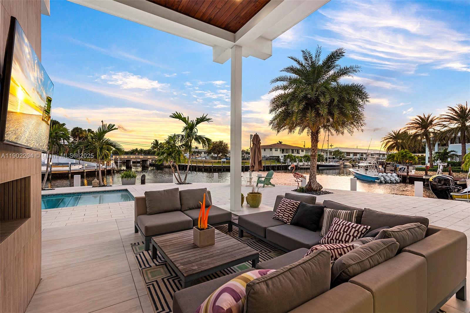 3701 Northeast 26th Avenue, Unit 1 Lighthouse Point, FL 33064 - Photo 19 of 46 a view of a terrace with furniture