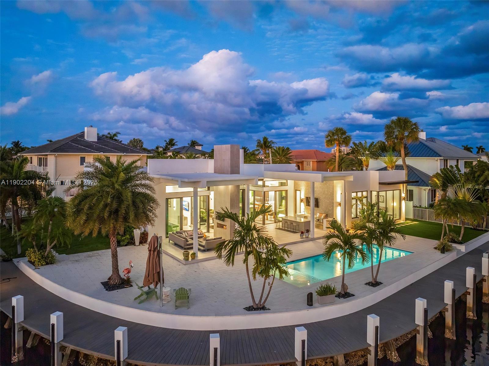 3701 Northeast 26th Avenue, Unit 1 Lighthouse Point, FL 33064 - Photo 2 of 46 a view of a house with outdoor space