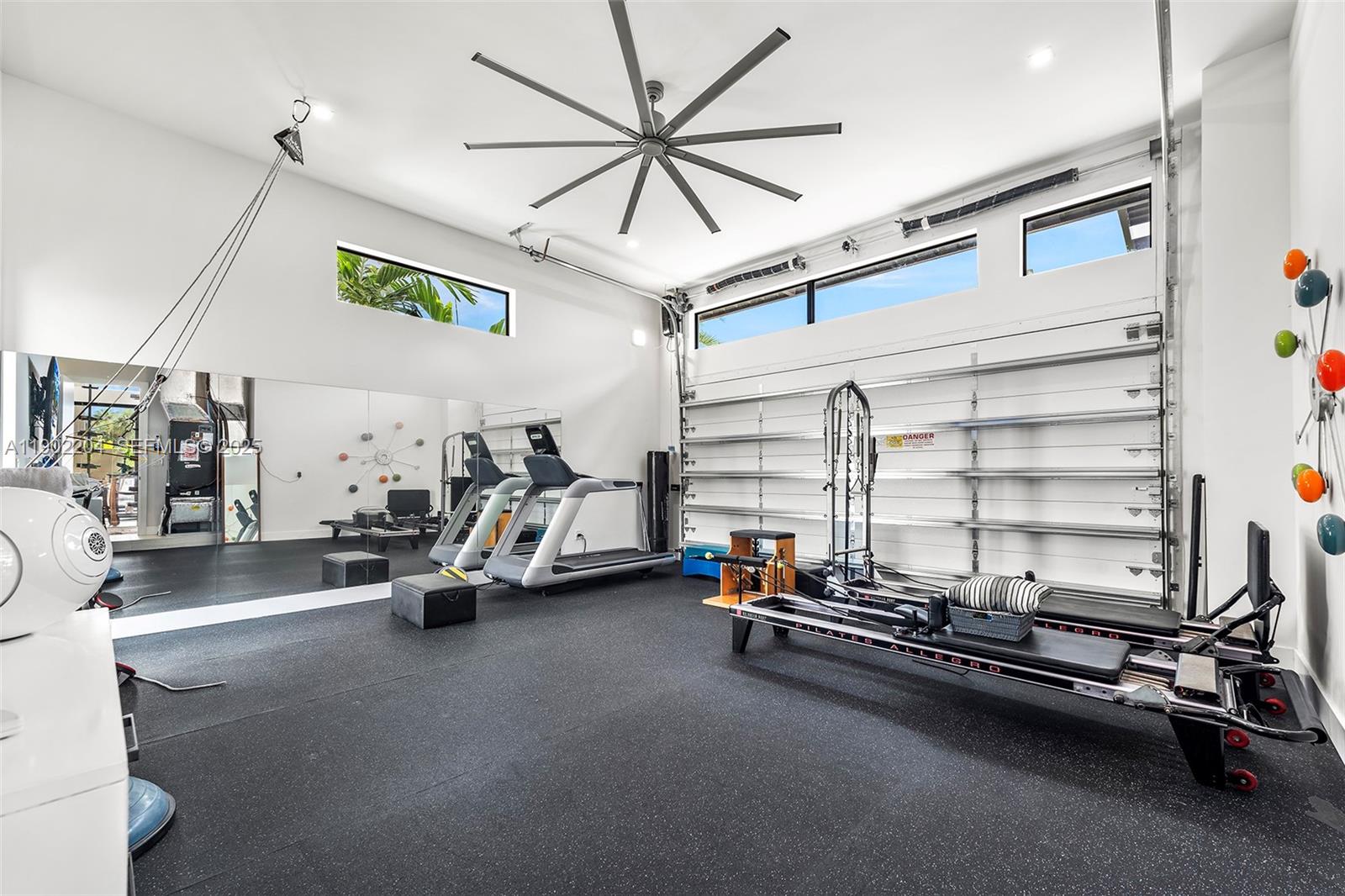 3701 Northeast 26th Avenue, Unit 1 Lighthouse Point, FL 33064 - Photo 45 of 46 a room with gym equipment