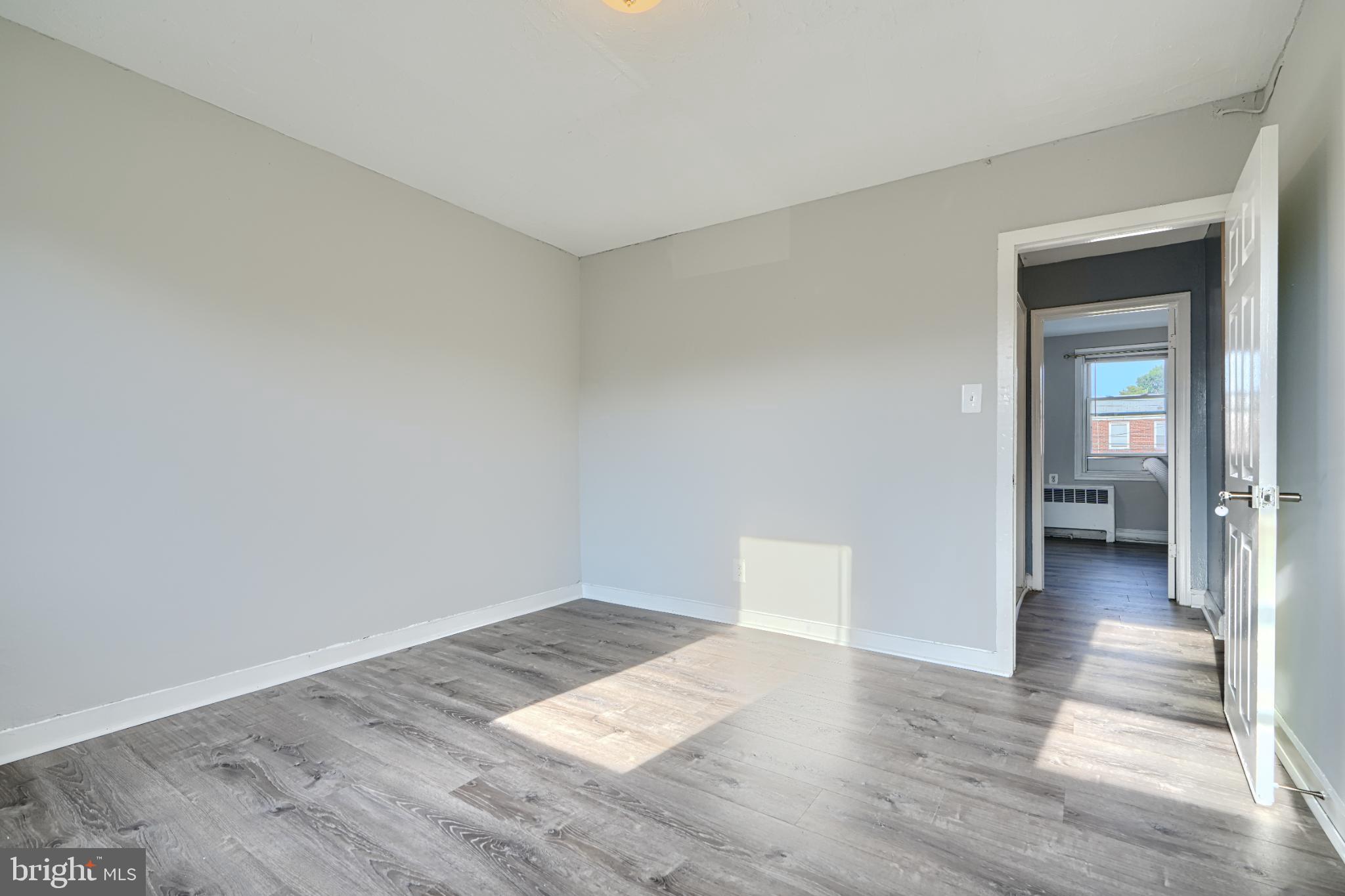 1236 Primrose Avenue Rosedale, MD 21237 - Photo 18 of 39 wooden floor in an empty room