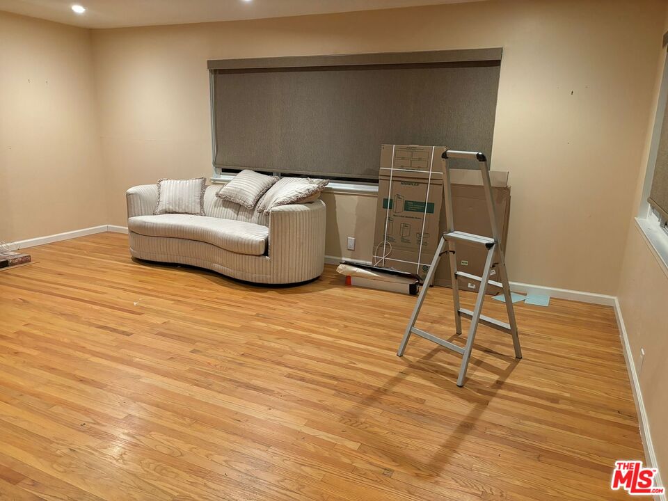 2 Cottage Lane San Carlos, CA 94070 - Photo 2 of 11 a living room with furniture and a wooden floor