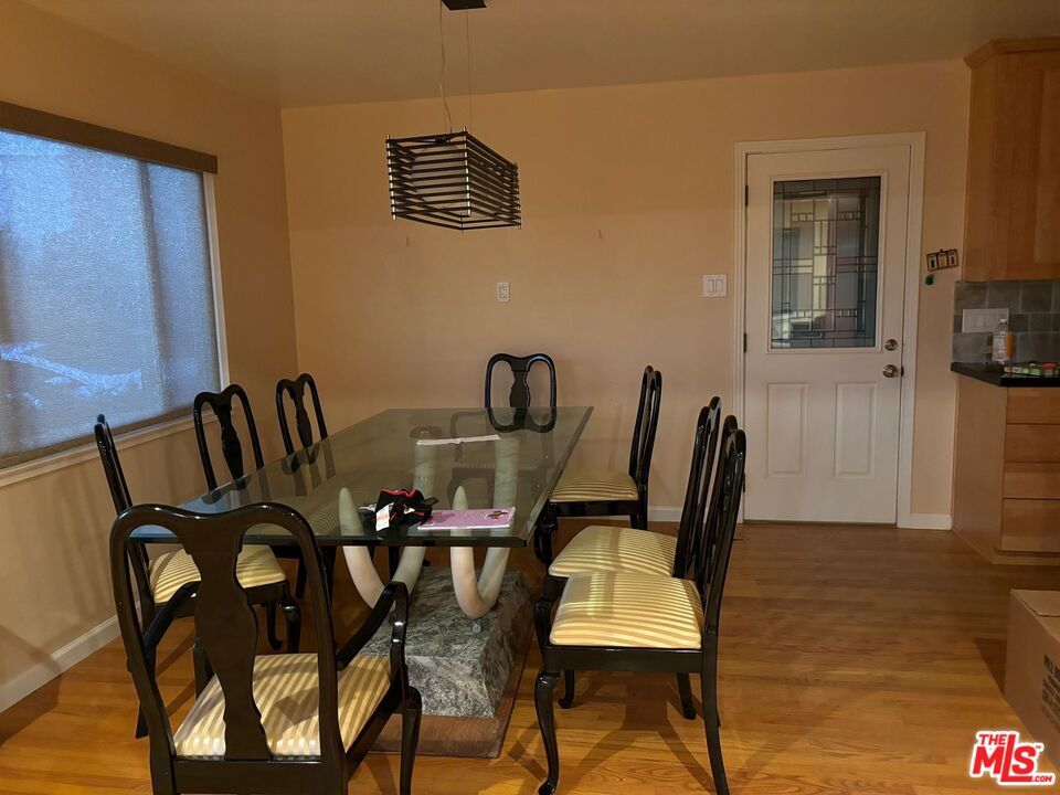 2 Cottage Lane San Carlos, CA 94070 - Photo 5 of 11 a view of a dining room with furniture and wooden floor