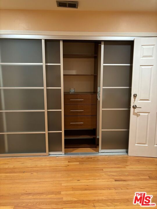 2 Cottage Lane San Carlos, CA 94070 - Photo 7 of 11 a view of an empty room with wooden floor and closet