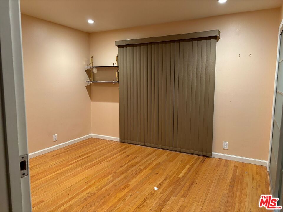2 Cottage Lane San Carlos, CA 94070 - Photo 8 of 11 an empty room with wooden floor