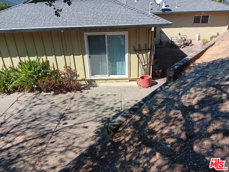 2 Cottage Lane San Carlos, CA 94070 - Photo 10 of 11 a front view of a house with a yard
