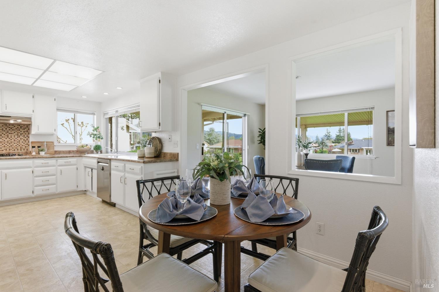 347 Twin Lakes Drive Santa Rosa, CA 95409 - Photo 12 of 47 a view of a dining room with furniture and window