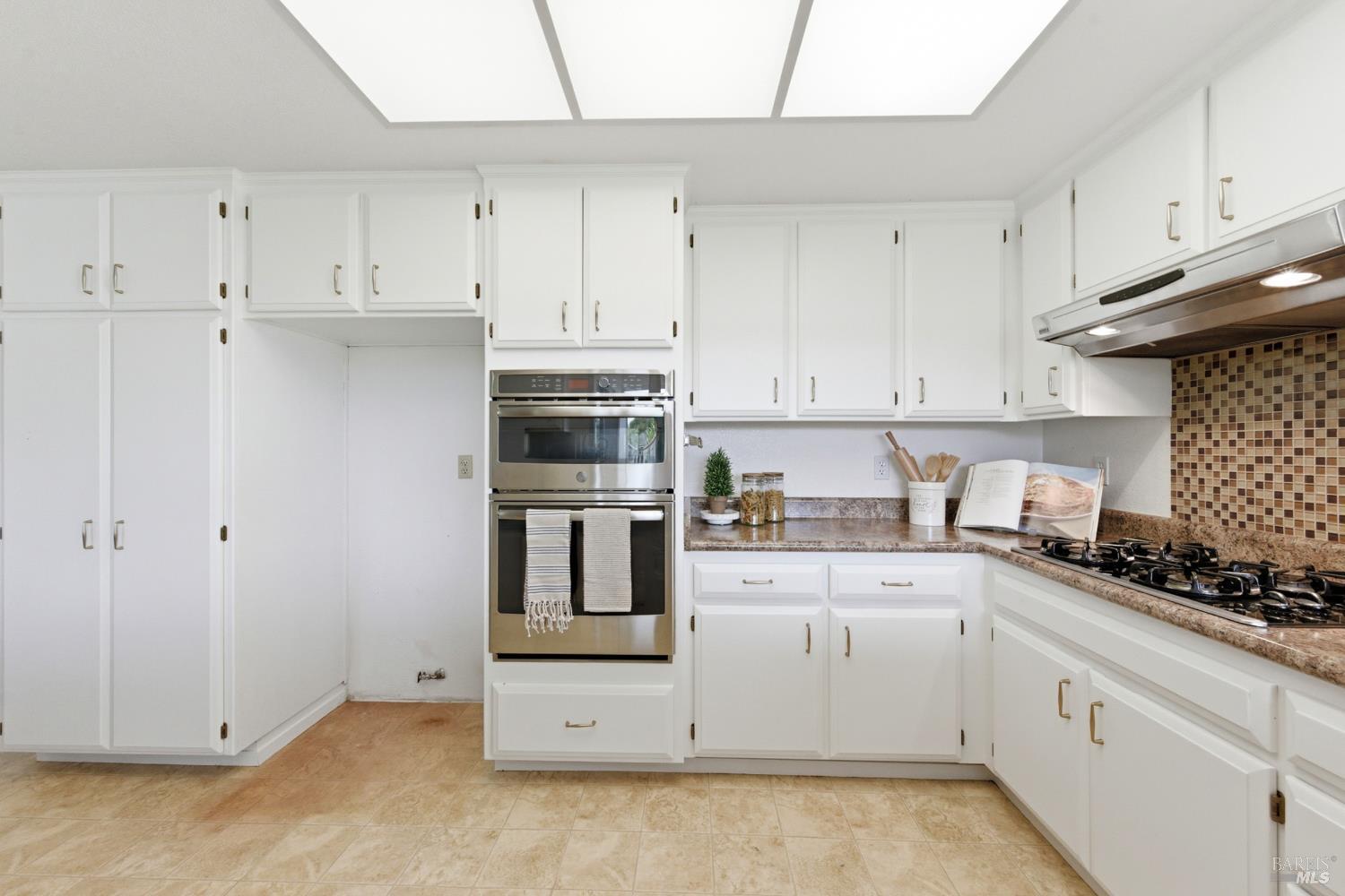 347 Twin Lakes Drive Santa Rosa, CA 95409 - Photo 15 of 47 a kitchen with cabinets appliances and a counter space