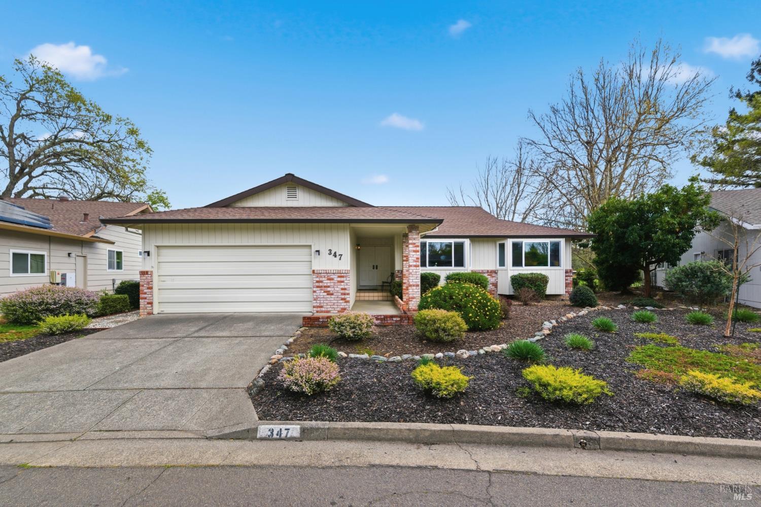 347 Twin Lakes Drive Santa Rosa, CA 95409 - Photo 2 of 47 a front view of a house with garden