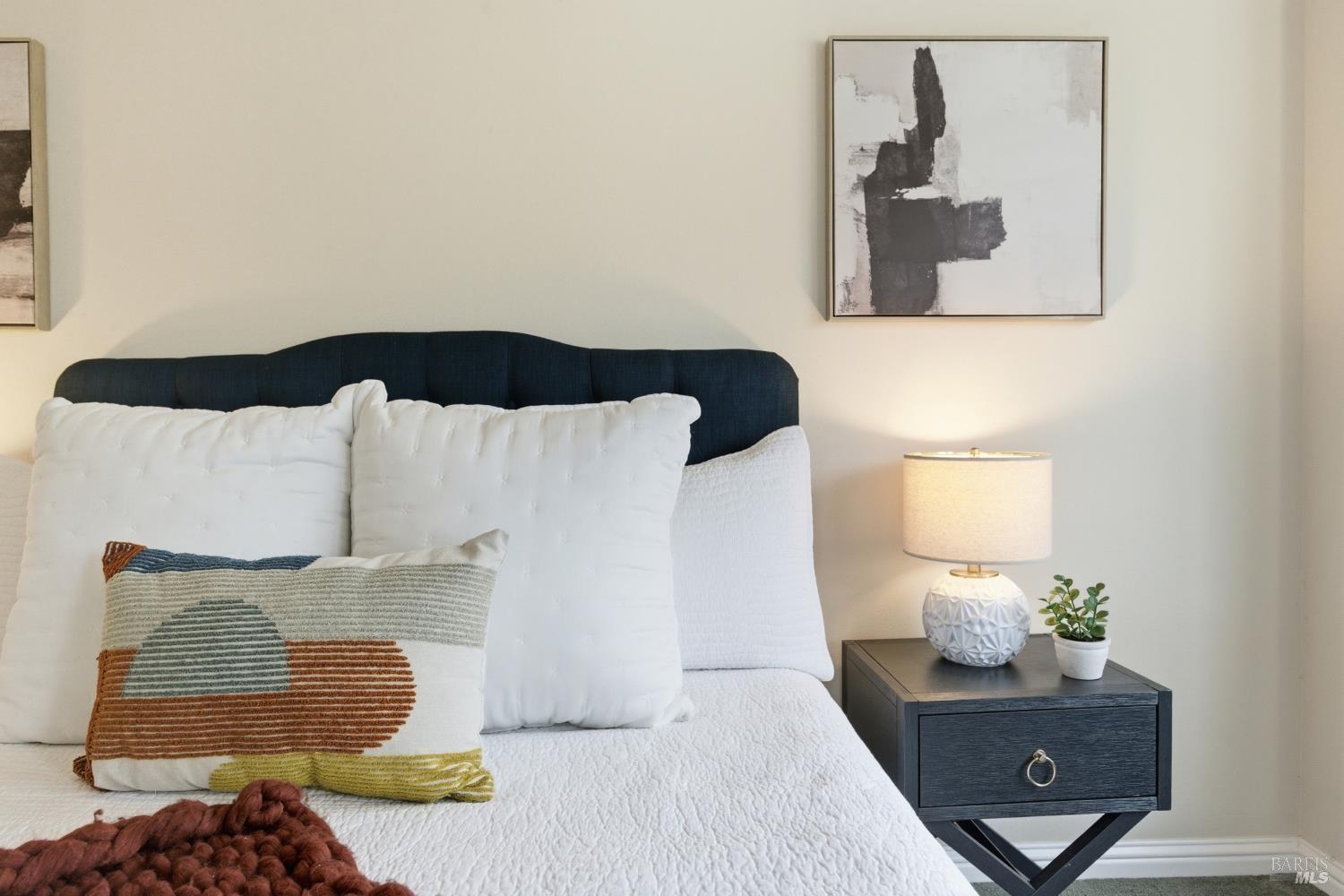 347 Twin Lakes Drive Santa Rosa, CA 95409 - Photo 28 of 47 a bedroom with a bed and a lamp on dresser