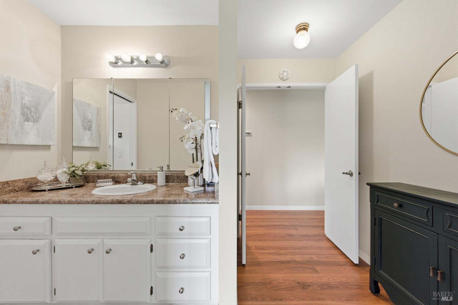 347 Twin Lakes Drive Santa Rosa, CA 95409 - Photo 29 of 47 a bathroom with a sink double vanity and a mirror