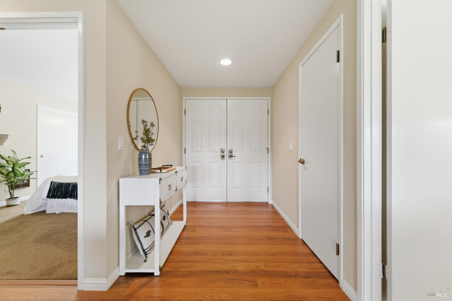 347 Twin Lakes Drive Santa Rosa, CA 95409 - Photo 4 of 47 a view of a hallway with wooden floor and staircase