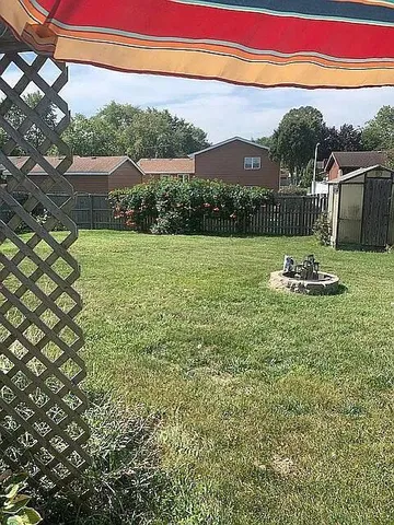 a lake view with a garden