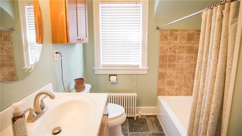 3377 Ivanhoe Road Sharpsville, PA 16150 - Photo 16 of 24 Clean, updated bathroom with tile shower surround.