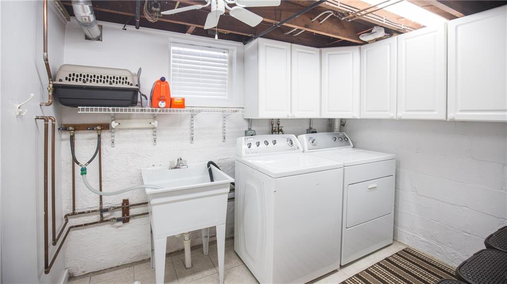3377 Ivanhoe Road Sharpsville, PA 16150 - Photo 21 of 24 Bright laundry room just off the mud room in the basement.
