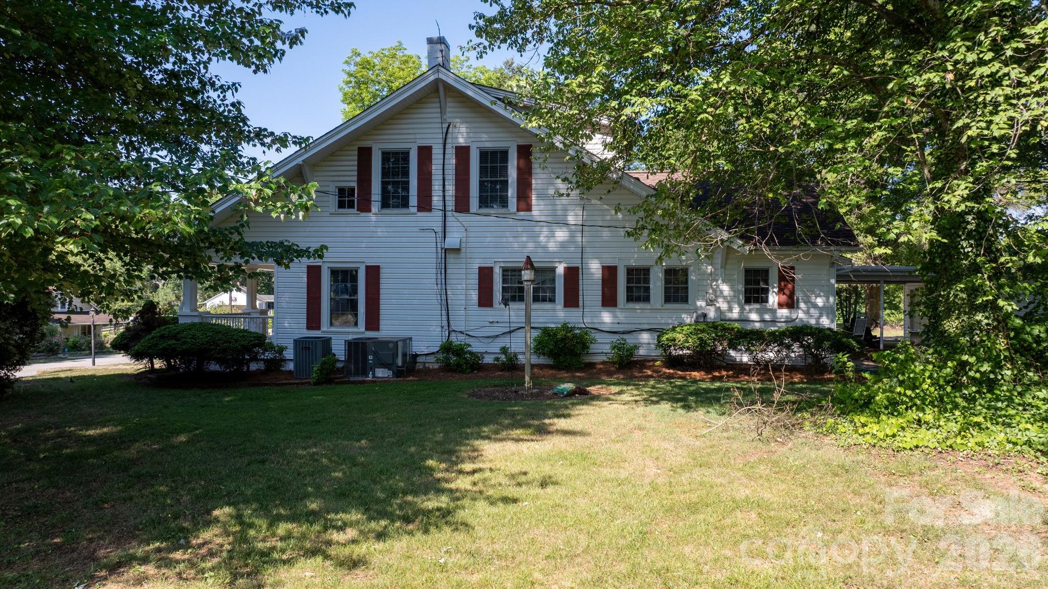 144 Hunter Bridge Road Stony Point, NC 28678 - Photo 35 of 45 a front view of a house with a yard