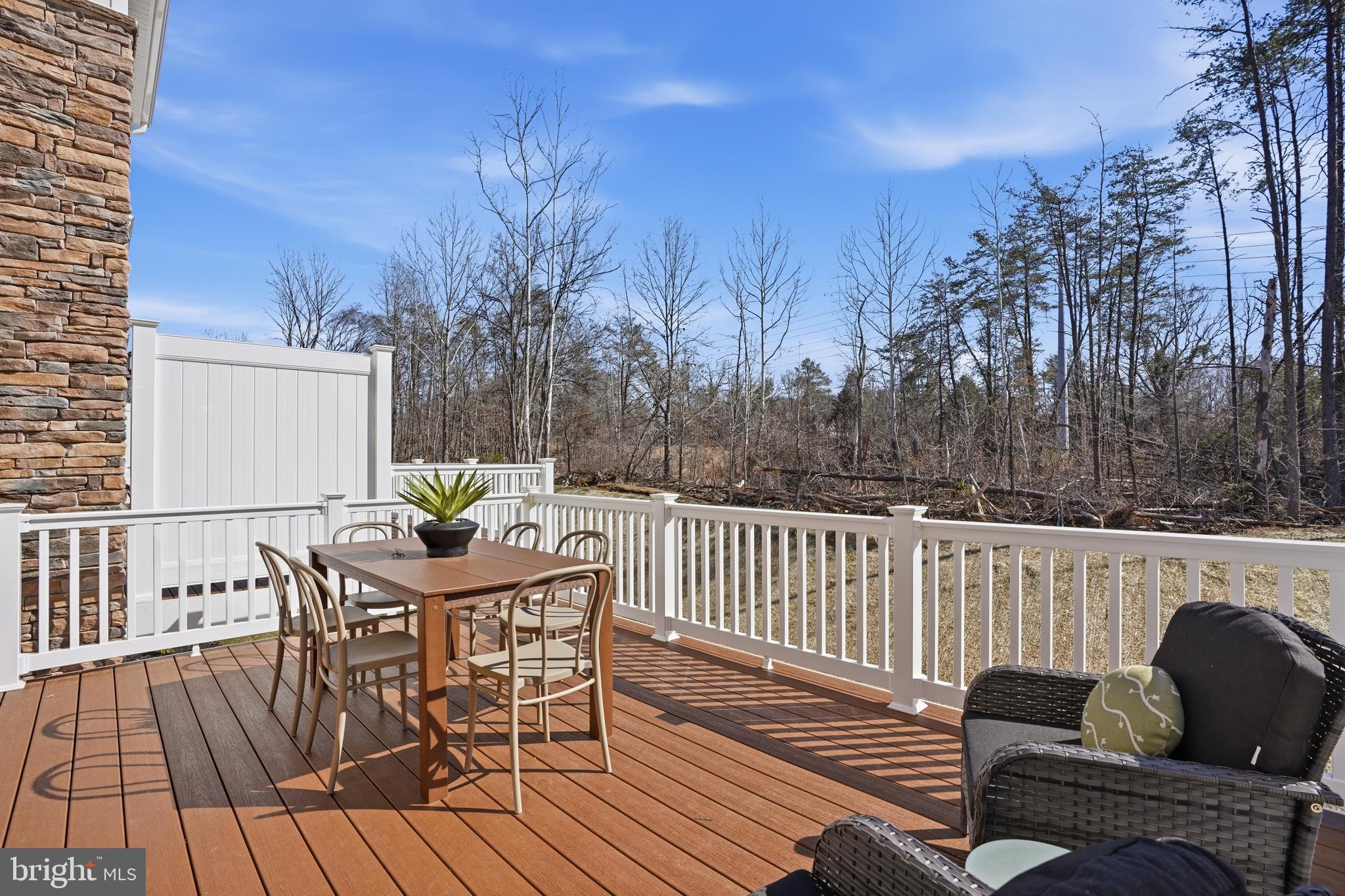 7610 River Reach Road Baltimore, MD 21244 - Photo 16 of 16 a view of a roof deck with furniture