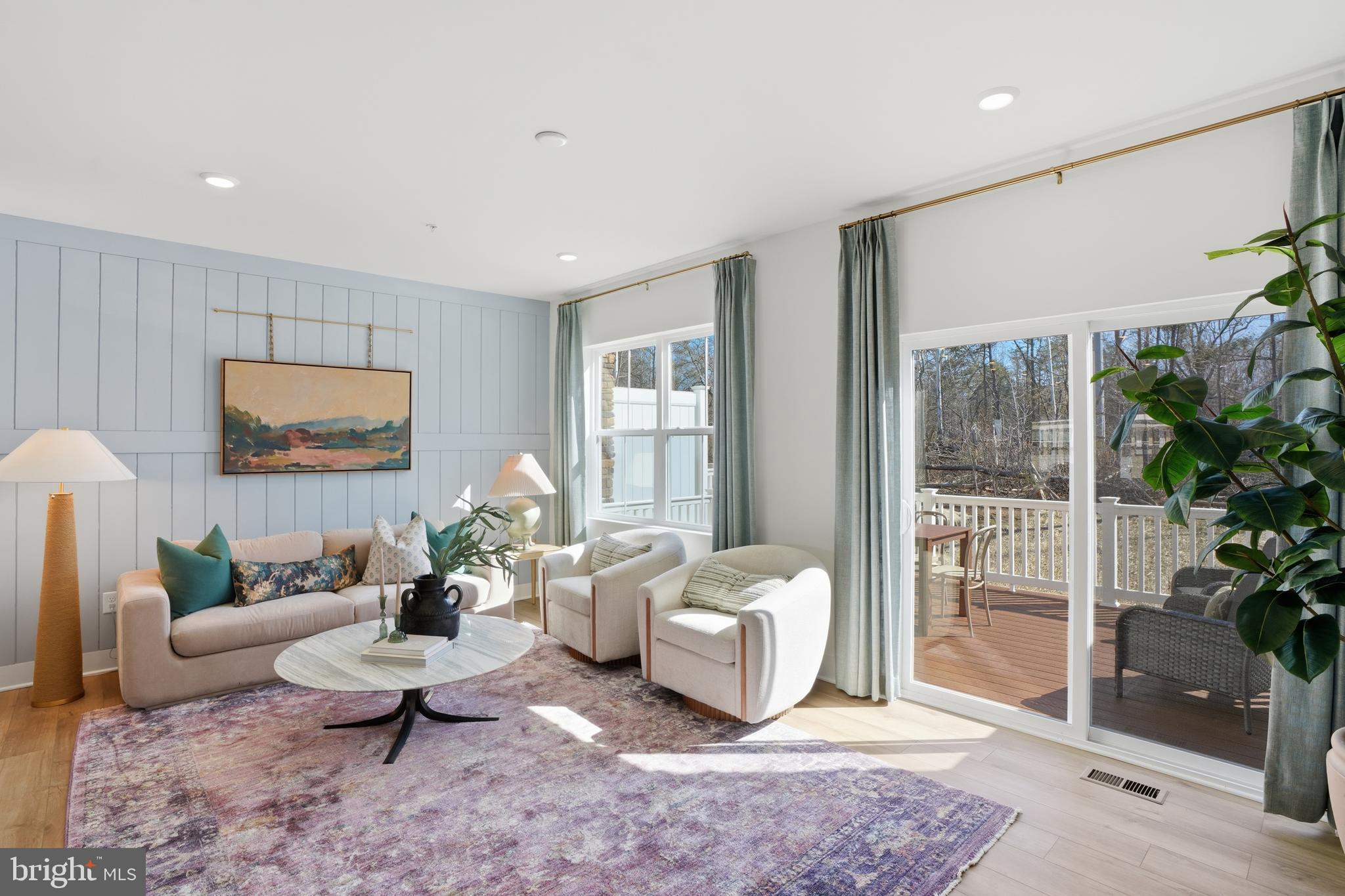 7610 River Reach Road Baltimore, MD 21244 - Photo 7 of 16 a living room with furniture and a potted plant