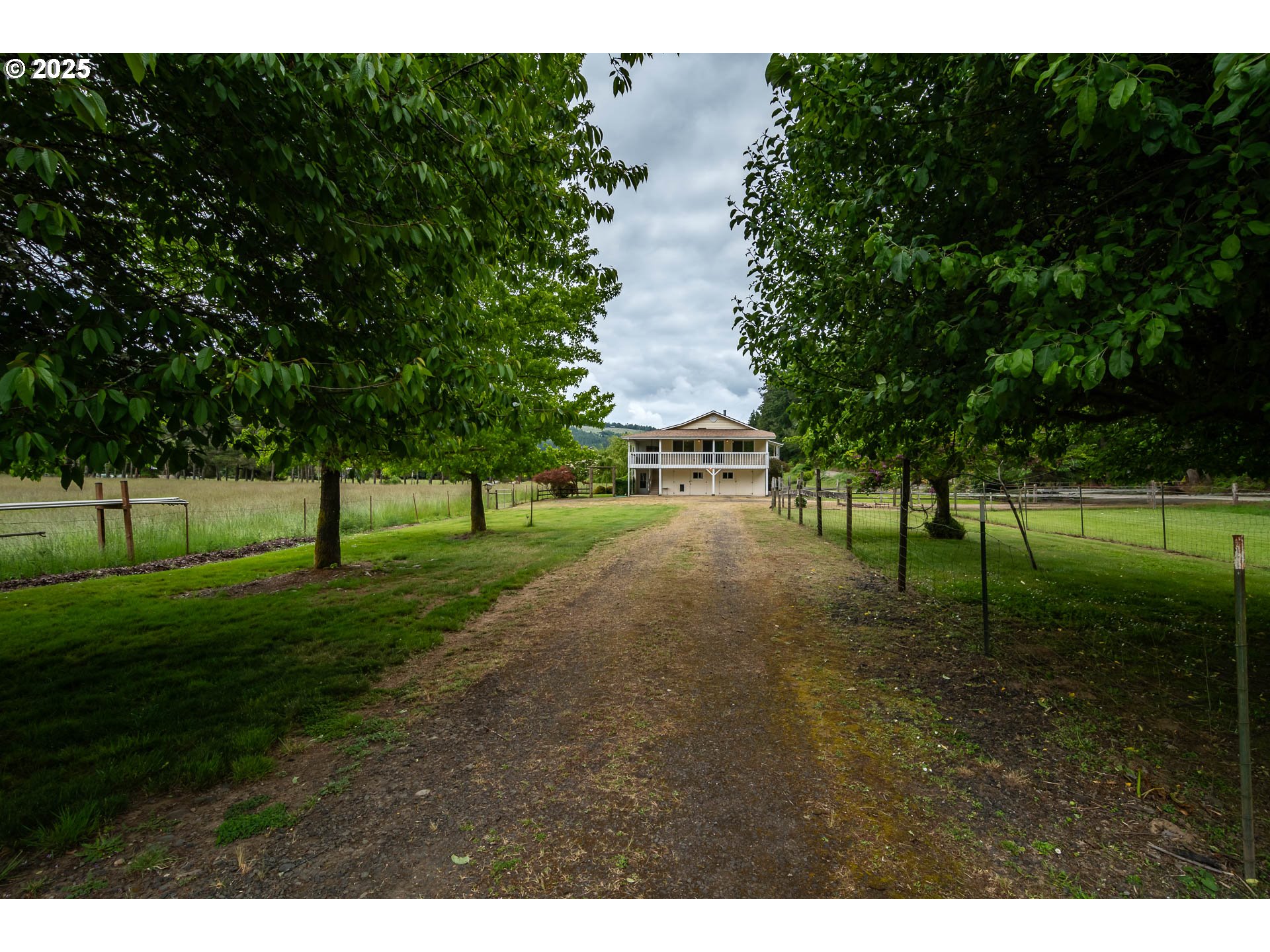 3333 Bullock Road Oakland, OR 97462 - Photo 38 of 48 a green field with lots of trees