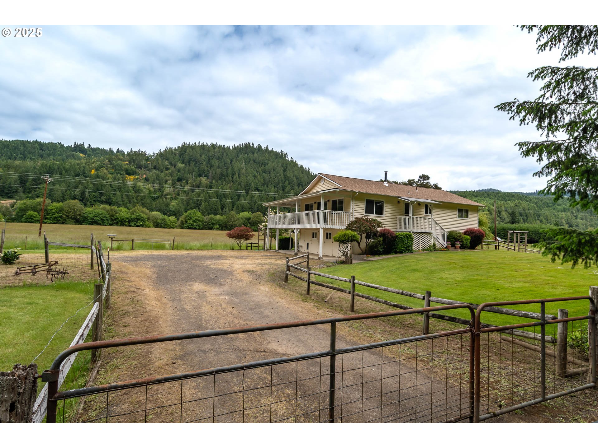 3333 Bullock Road Oakland, OR 97462 - Photo 46 of 48 a view of a swimming pool with a garden